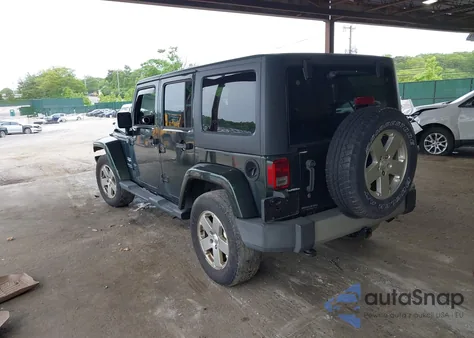 2011 Jeep Wrangler Unlimited Sahara from USA, damaged, VIN 1J4HA5H15BL520300
